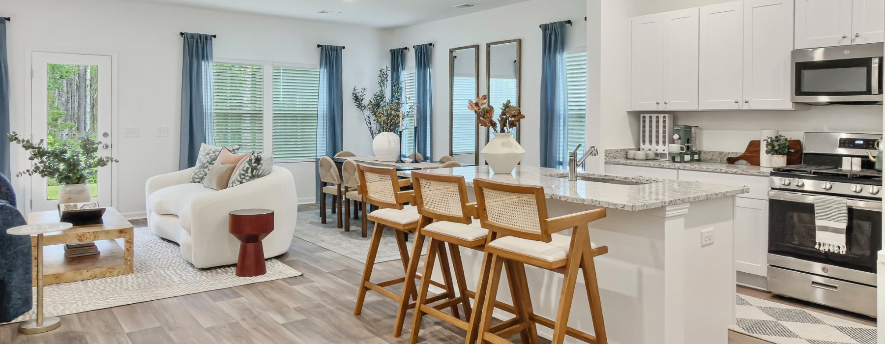 a kitchen with white cabinets