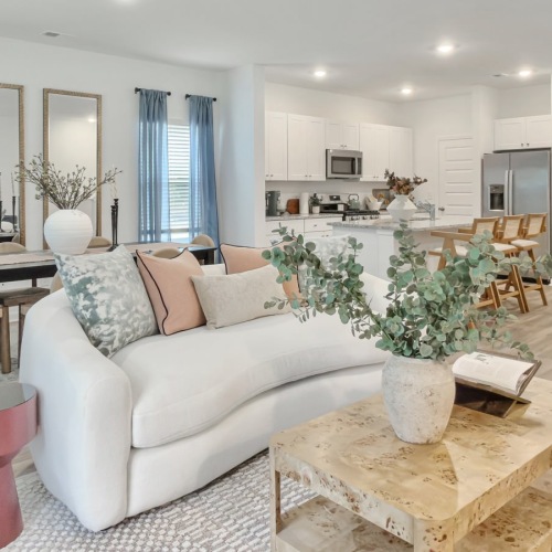 a living room with a couch and a coffee table